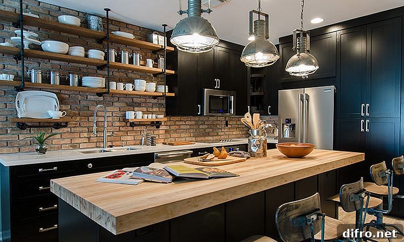 Reclaimed brick wall backdrop of the kitchen giving industrial charm