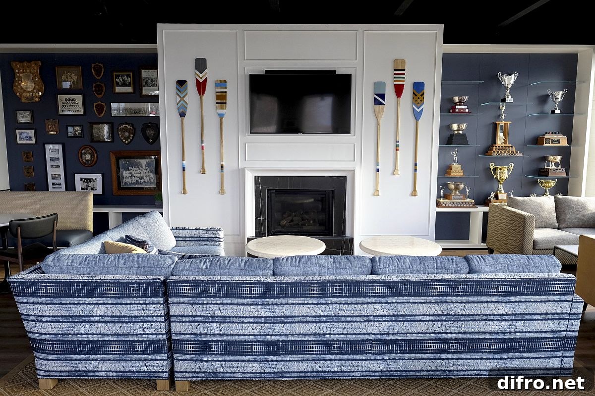 Fireplace area with paddles and memorabilia