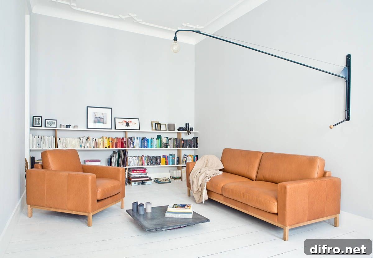 Books organized by color on shelves