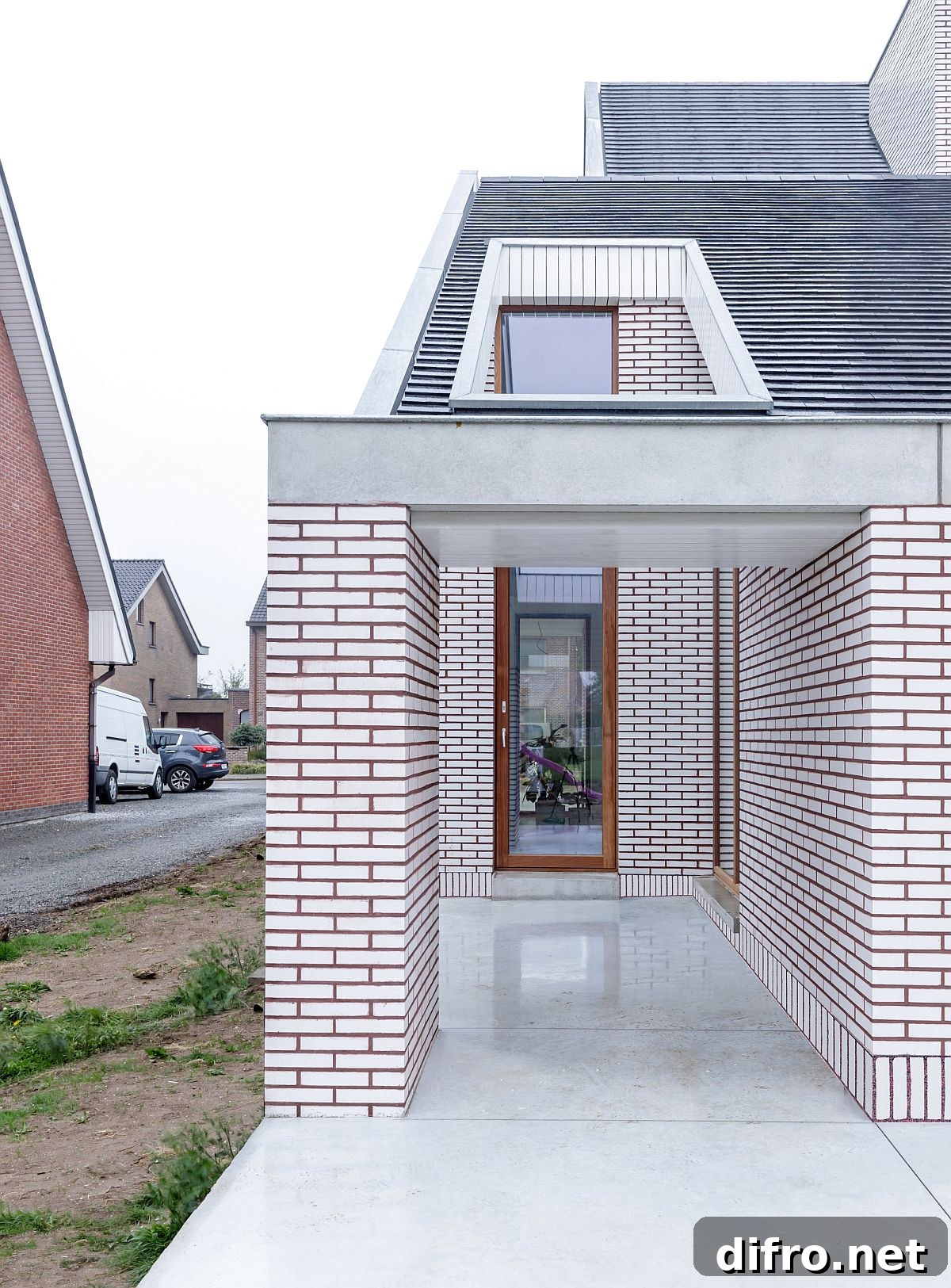 Skylight and windows bring light into the house while also shaping the custom design of the exterior