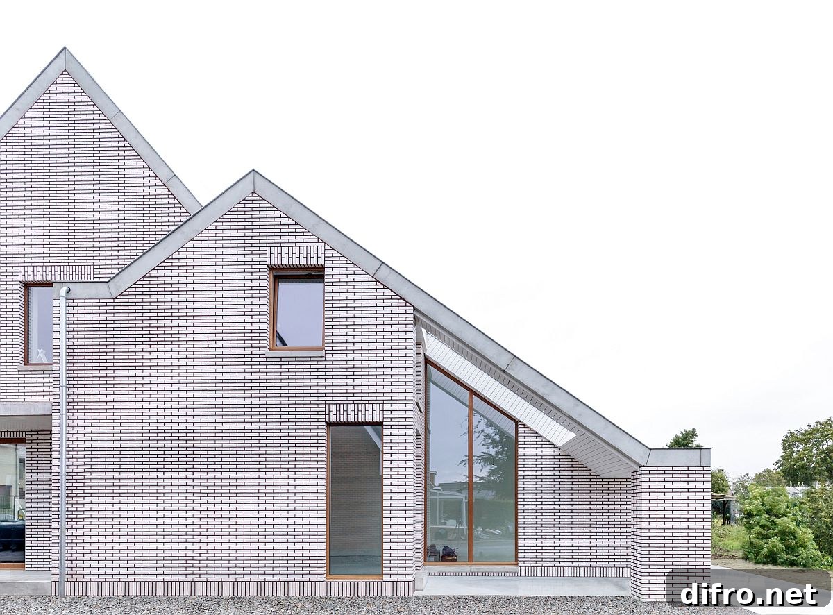Space-savvy single-family house in Belgium with a white brick exterior
