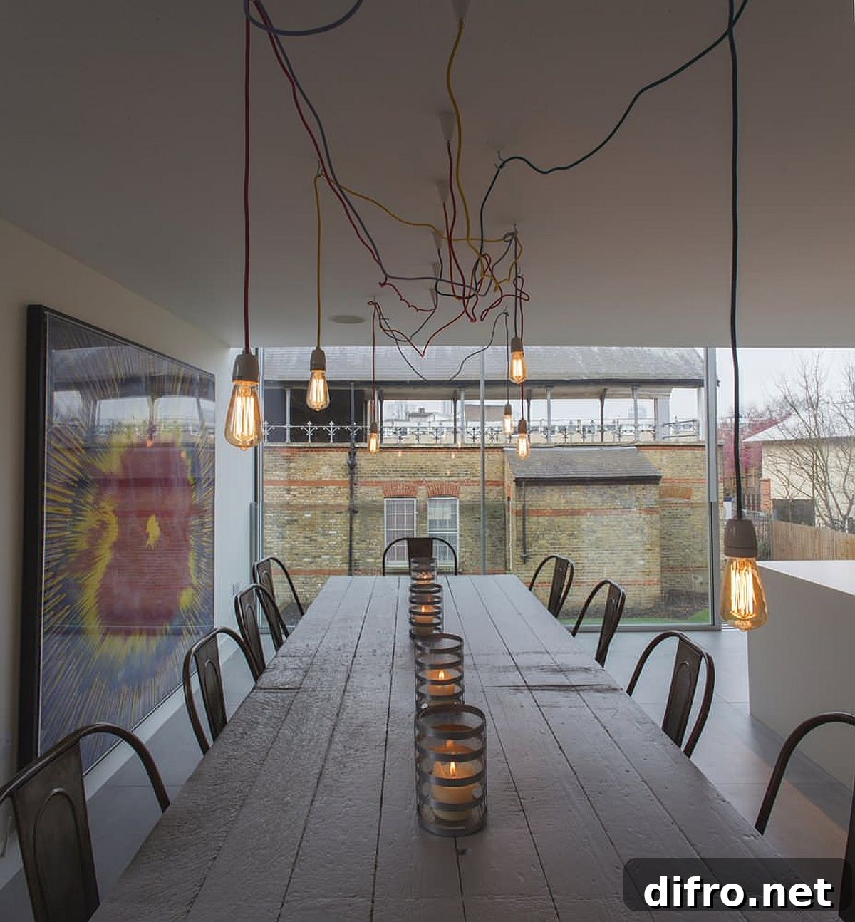 Edison bulb lighting in a modern minimal dining space