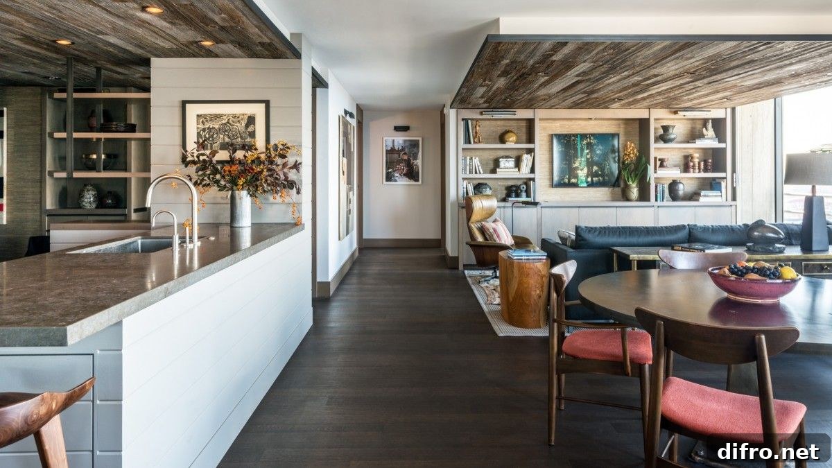 Wooden ceiling defines kitchen and living area