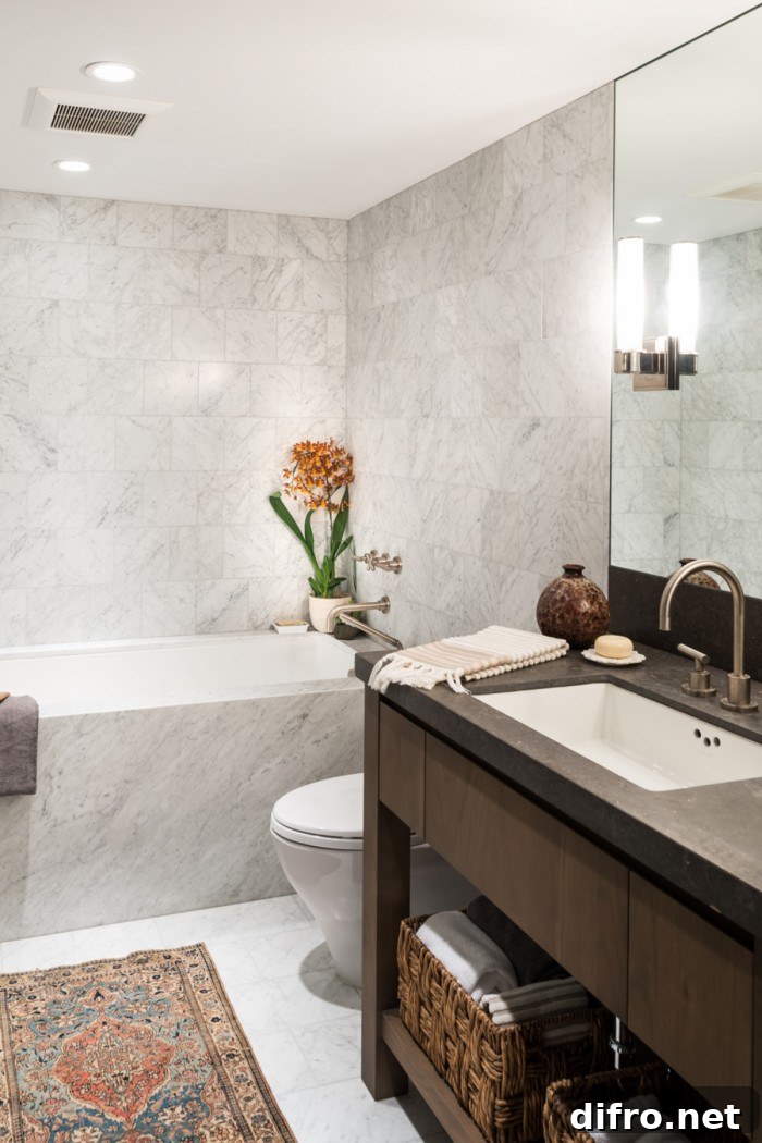 Custom wooden vanity in a modern white bathroom