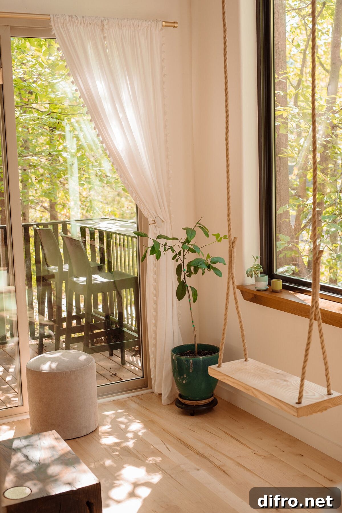 Swing next to the window gives the interior a playful appeal