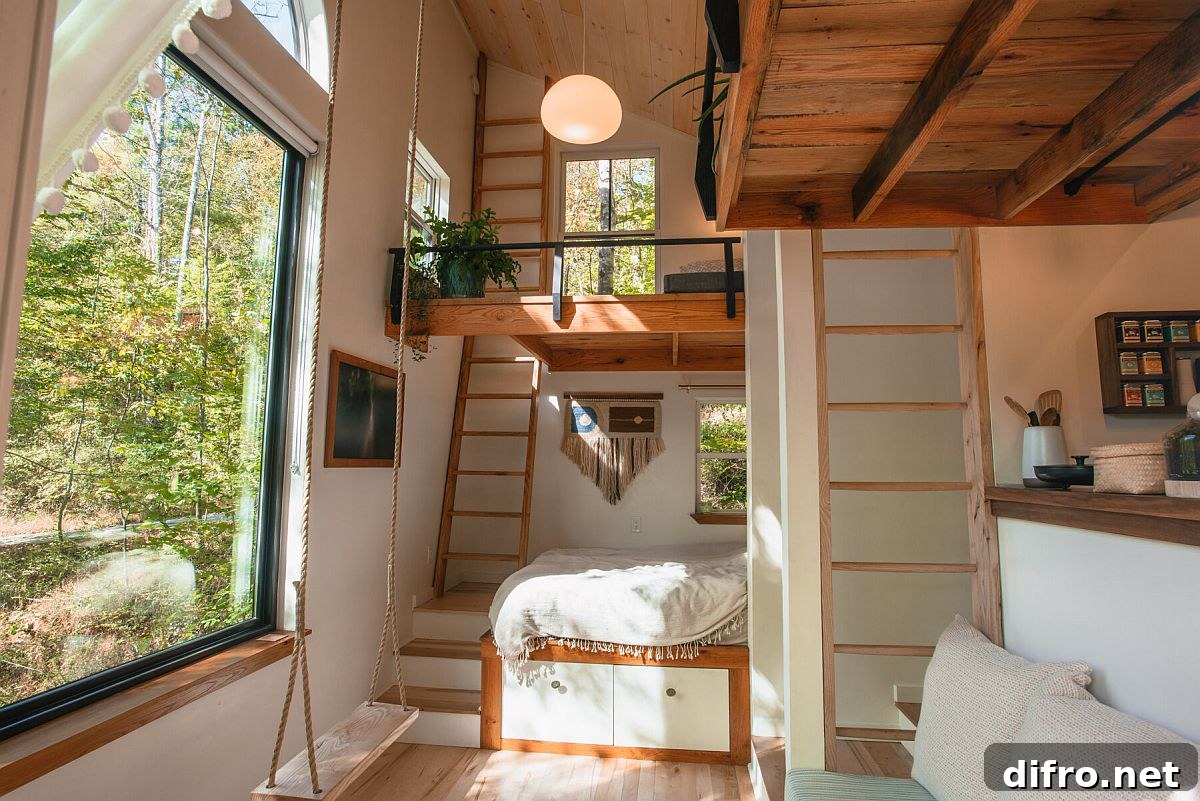Double-height ceiling of the cabin provides loft sleeping spaces that offer privacy
