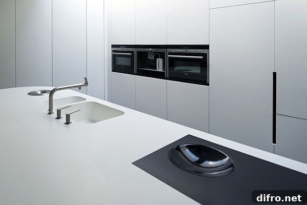 Interior detail emphasizing materials: concrete, tile and steel