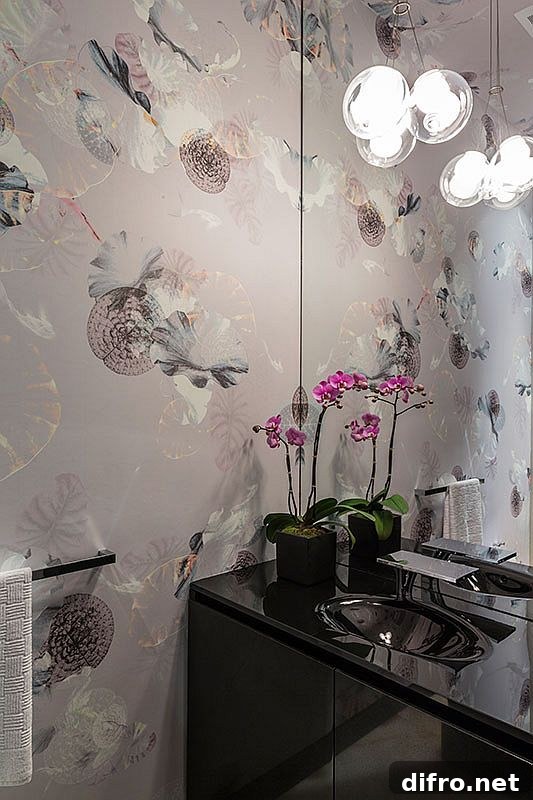 Powder room with patterned wallpaper