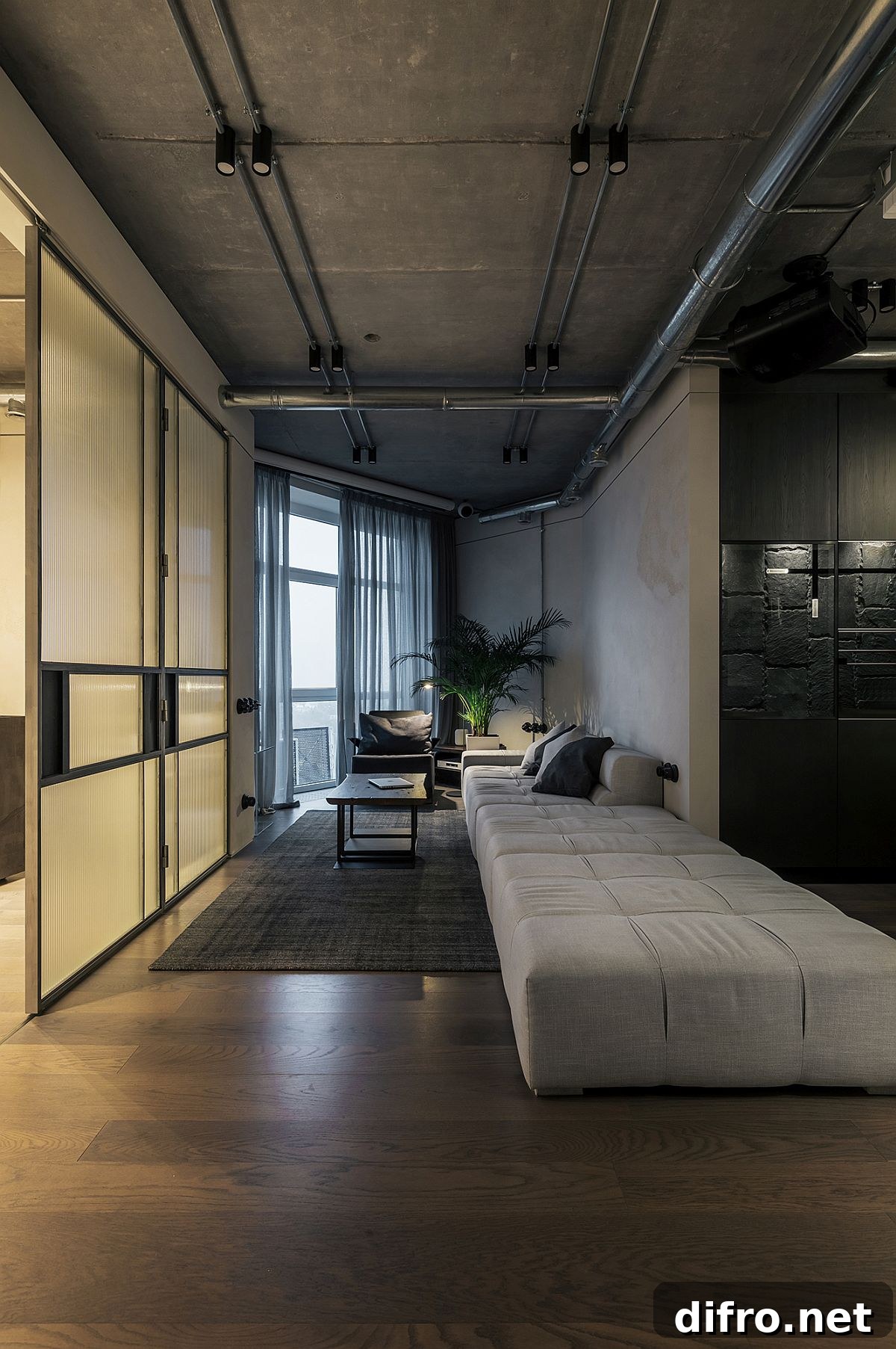 Narrow and low-slung sofa is absolutely perfect for the light-filled sitting area