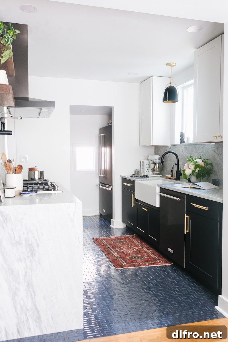 Blue H-pattern tiles creating a unique kitchen floor