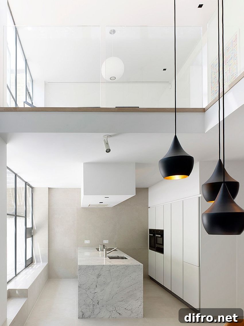 Polished white apartment interior with mezzanine and pendant lights