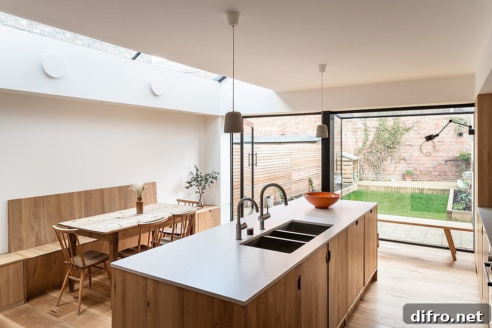 White and wood modern kitchen in Ogee House