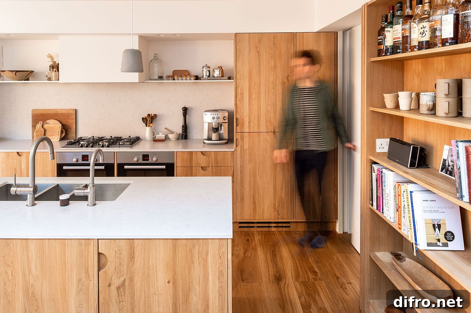 Floating shelves and closed cabinets in modern kitchen