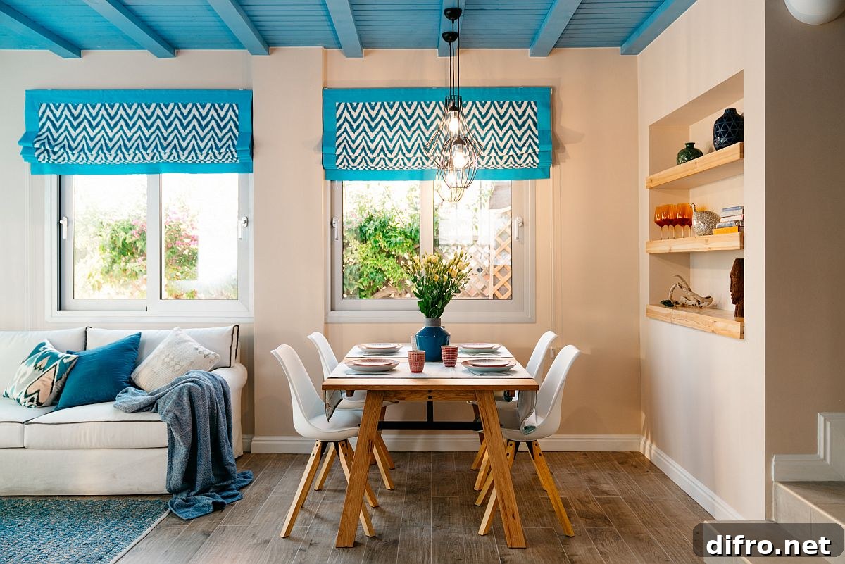 Eye-catching blue ceiling in a modern Mediterranean dining space