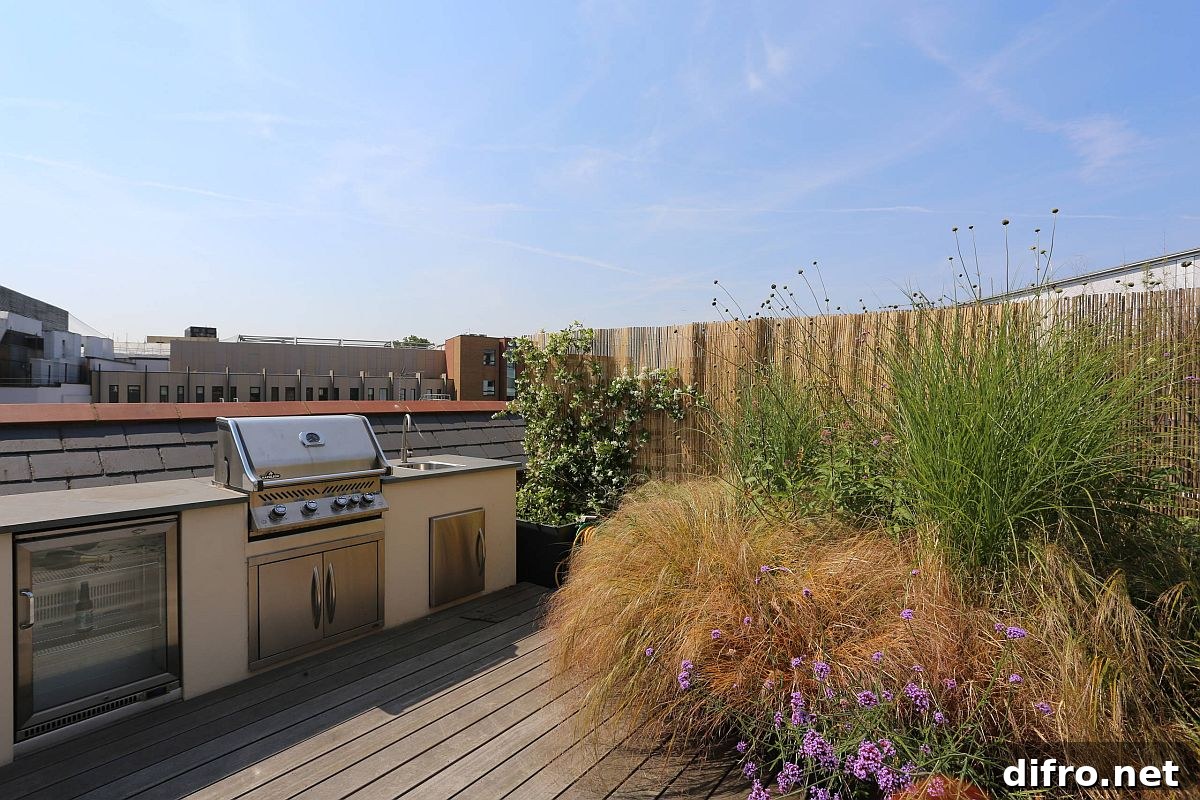 Rooftop garden with an integrated outdoor kitchen