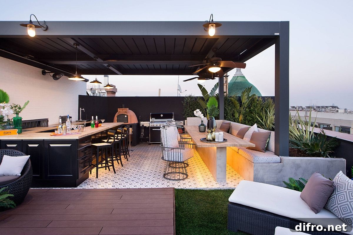 Covered rooftop kitchen and bar integrated with a social seating area
