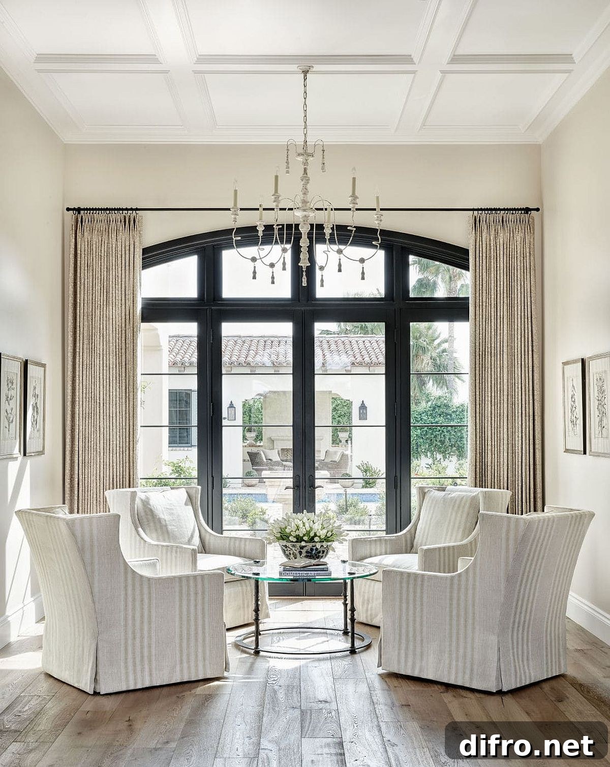Gorgeous white sitting room filled with natural light and a defining window
