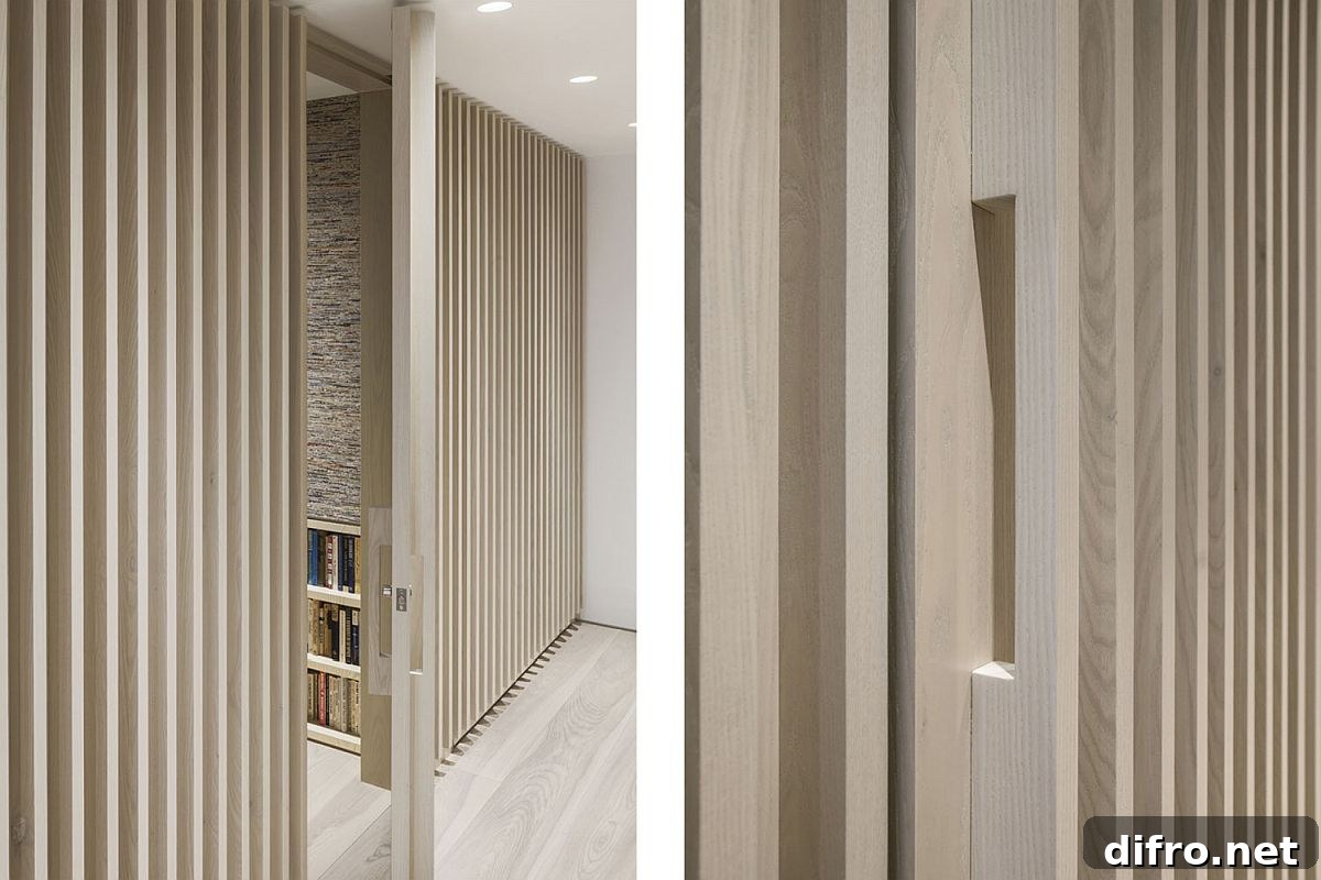 Vertical battens shape the entry of the Manhattan loft