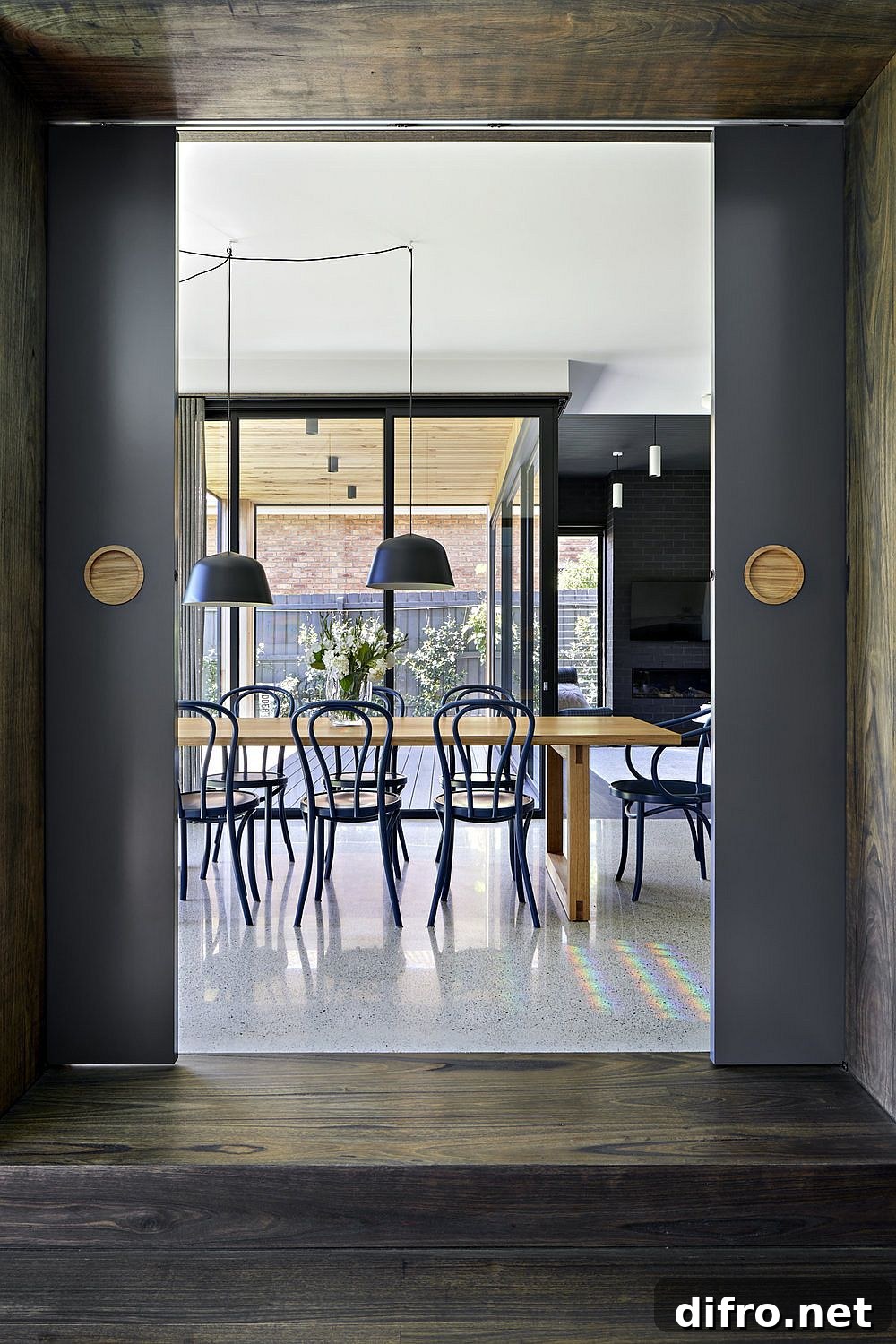Bluish-gray dining area in renovated family home