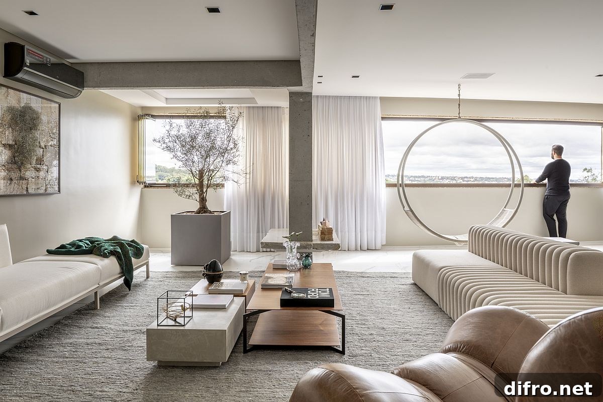 Polished contemporary living room with pendulum chair