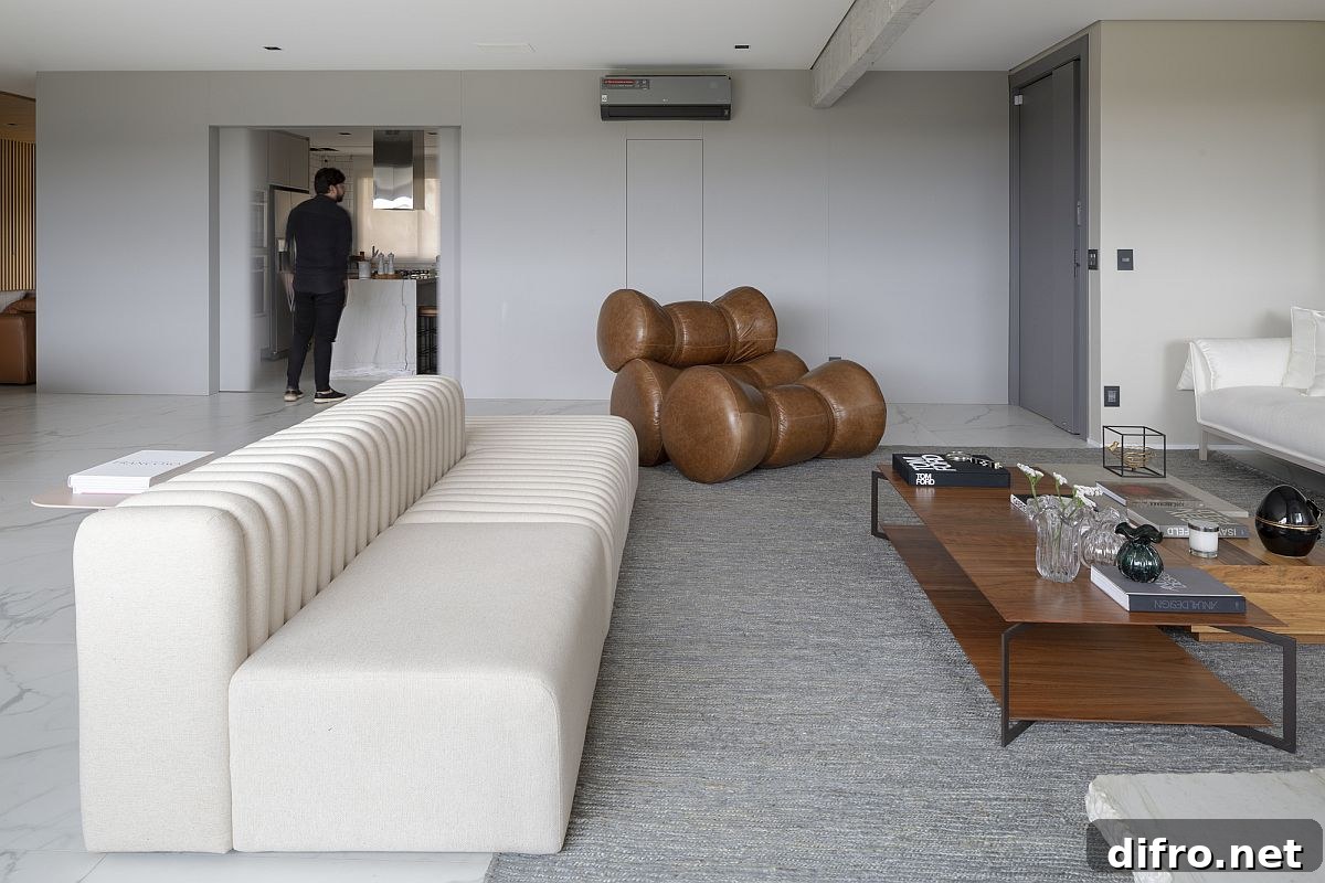 White sofa with brown relaxing chair
