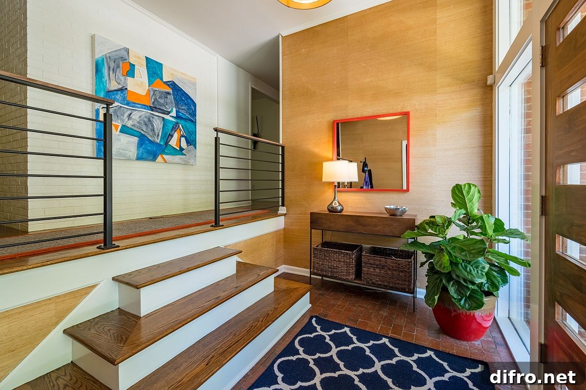 Rug softens the brick floor in the entryway