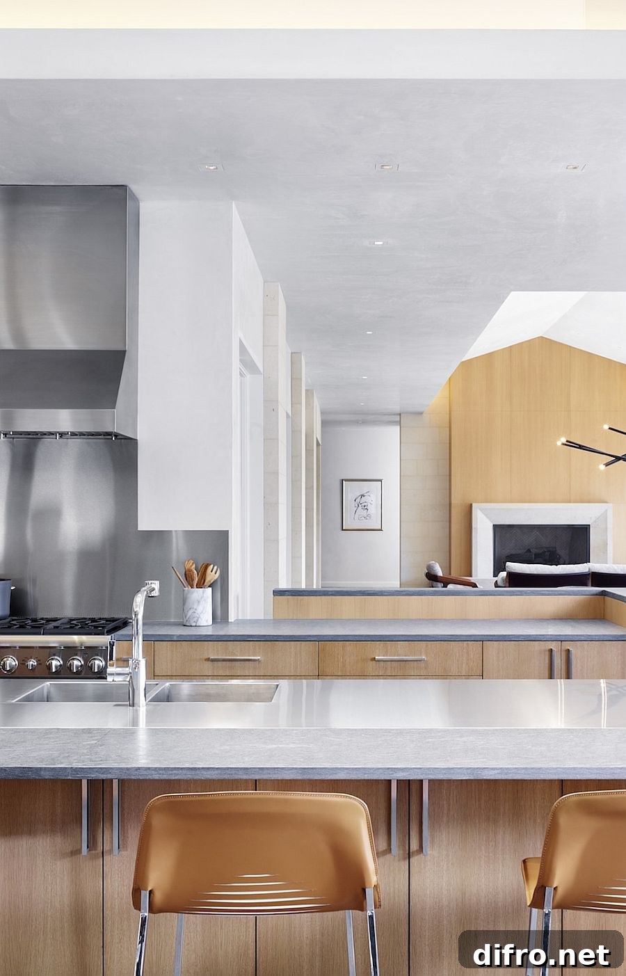 Dining area and kitchen with white and wood color scheme
