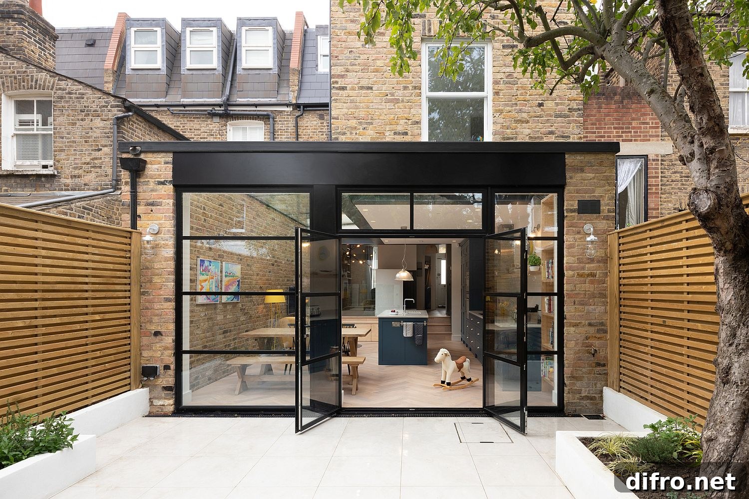 Contemporary rear extension in glass and brick