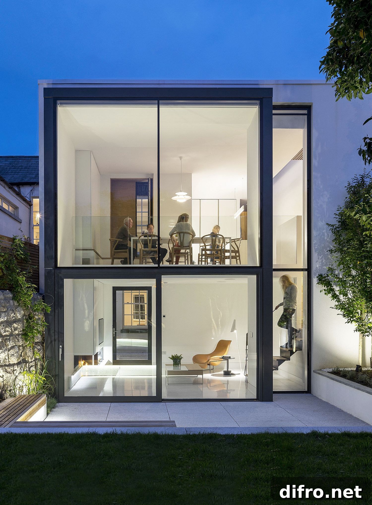 Victorian home with floor-to-ceiling glass walls