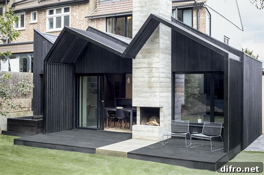 Dark wood and concrete rear extension