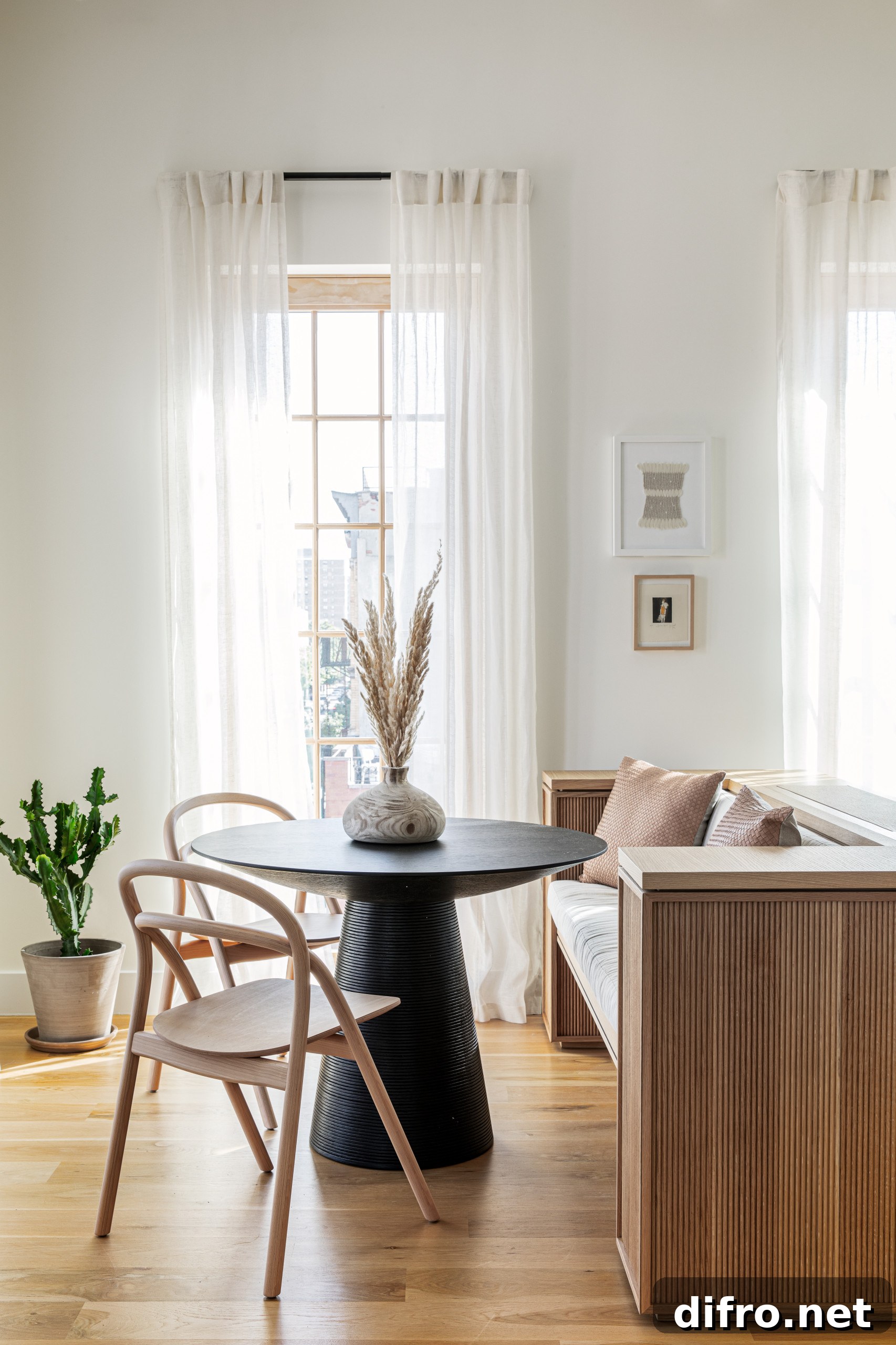 Banquette seating in a small Scandinavian dining room