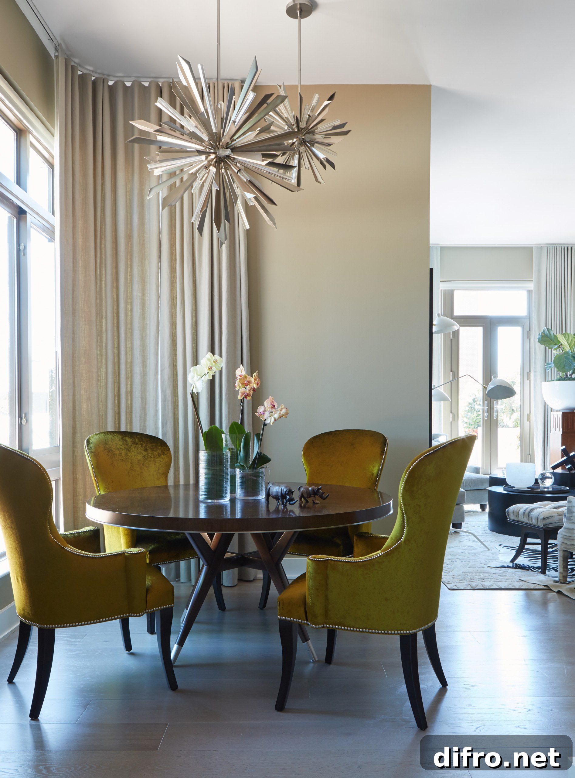 Contemporary dining room with yellow-green chairs