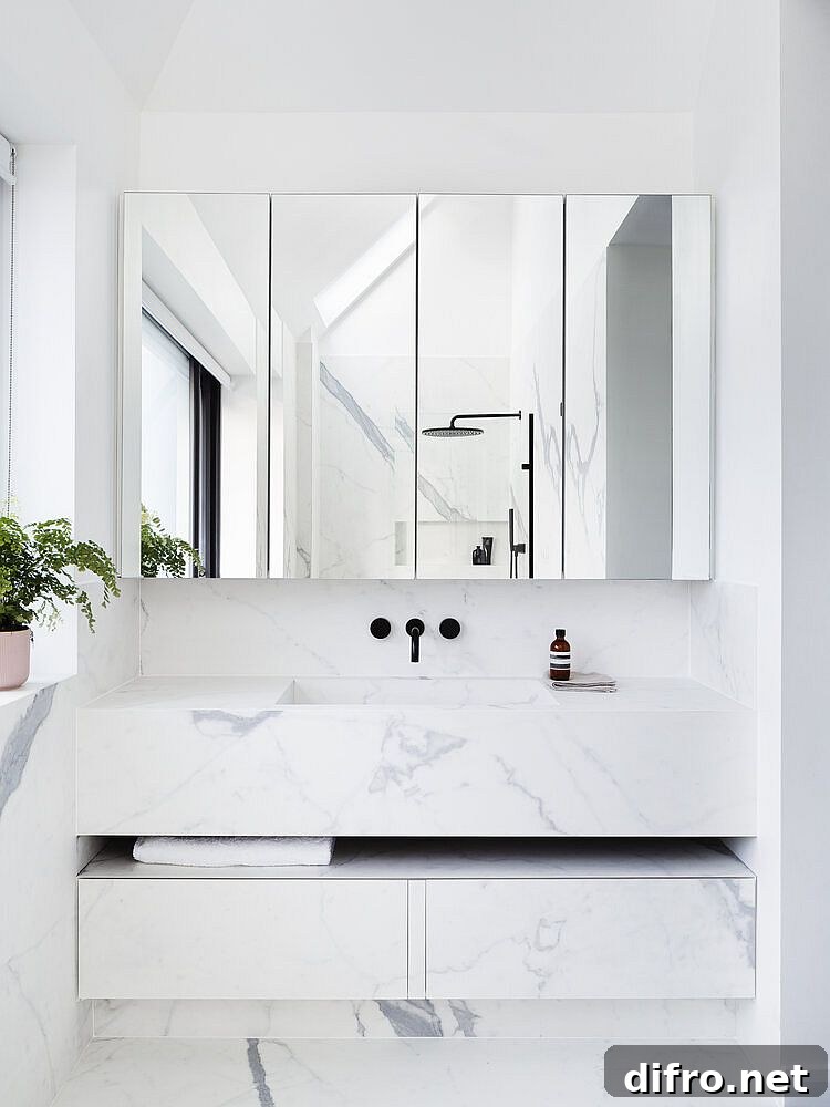 Bespoke vanity in marble with Italian design for the monochromatic contemporary bathroom