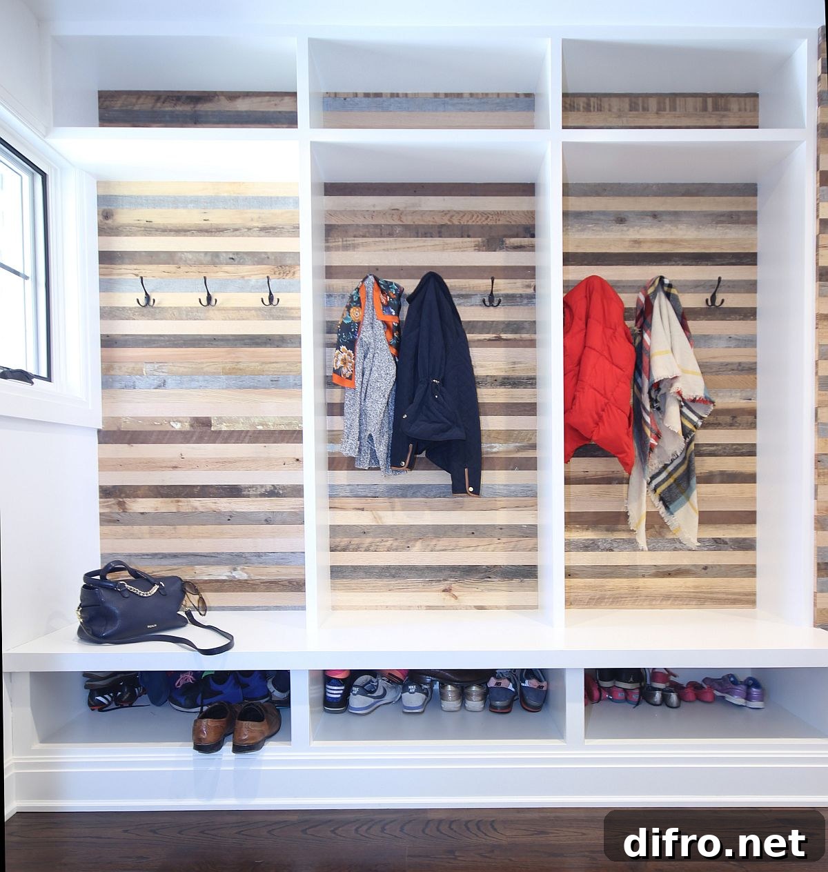 Reclaimed wood sections in modern entryway