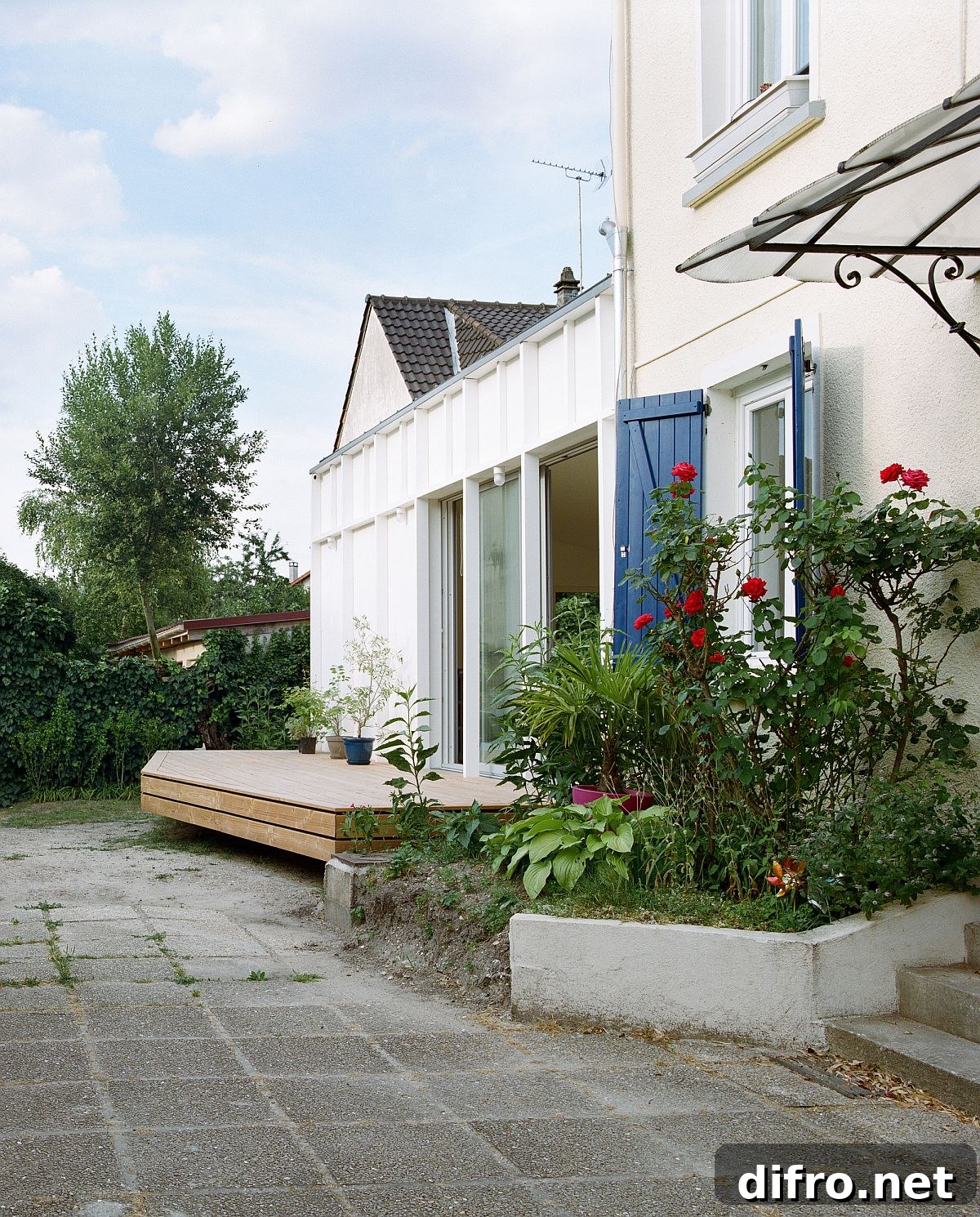 Rear extension integrating with original 1960s house