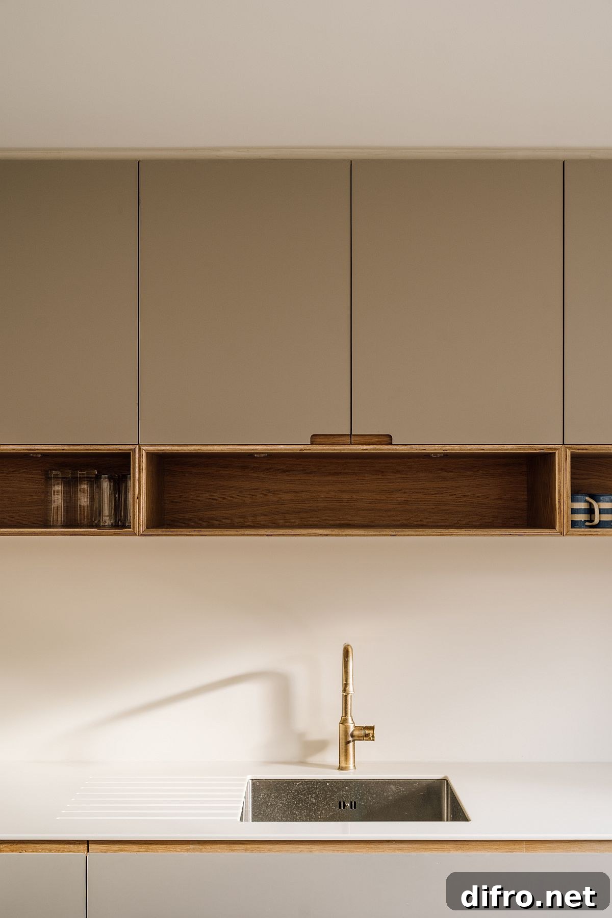 Kitchen cabinets in laminated plywood with oak accents
