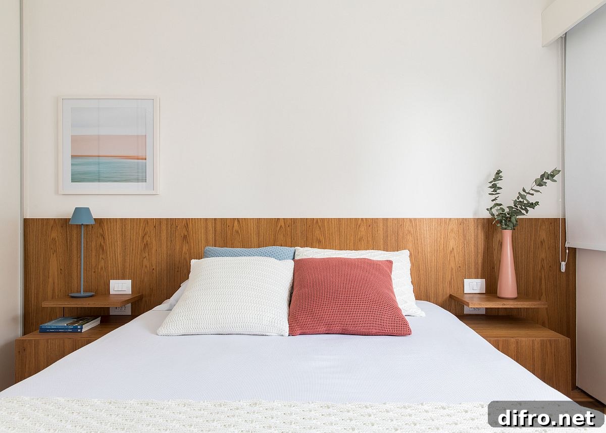 Small contemporary bedroom in white and wood with subtle pastel accents