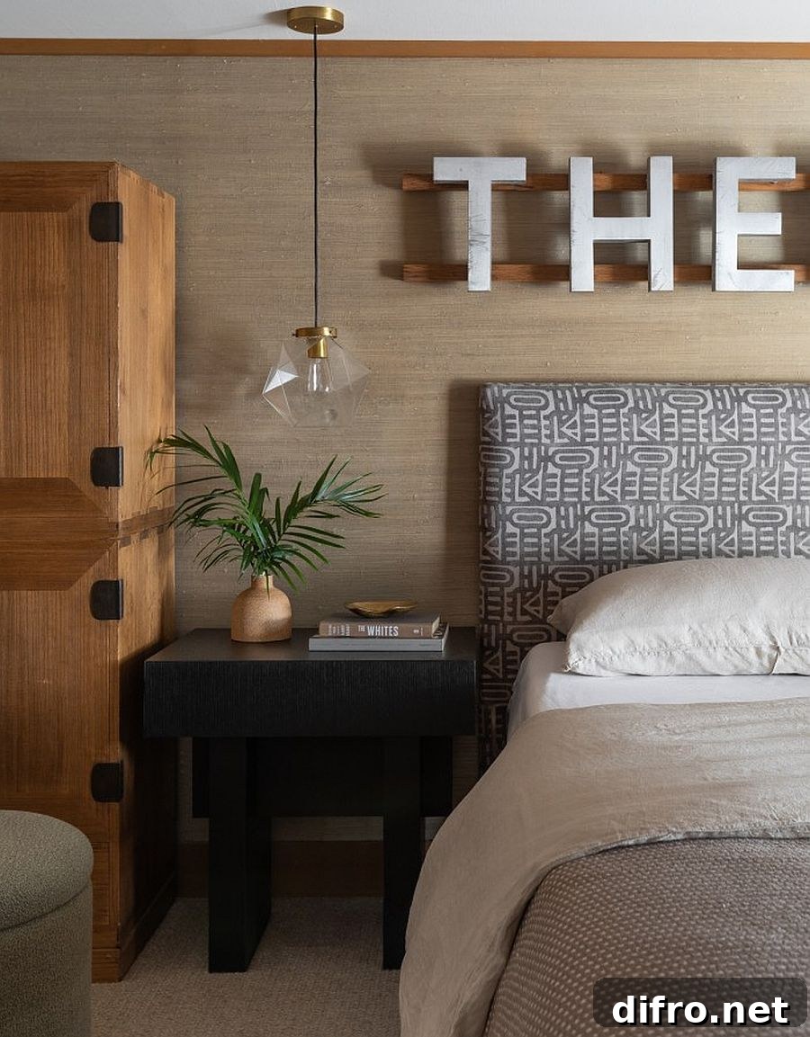 Bedroom with pendant and custom walls