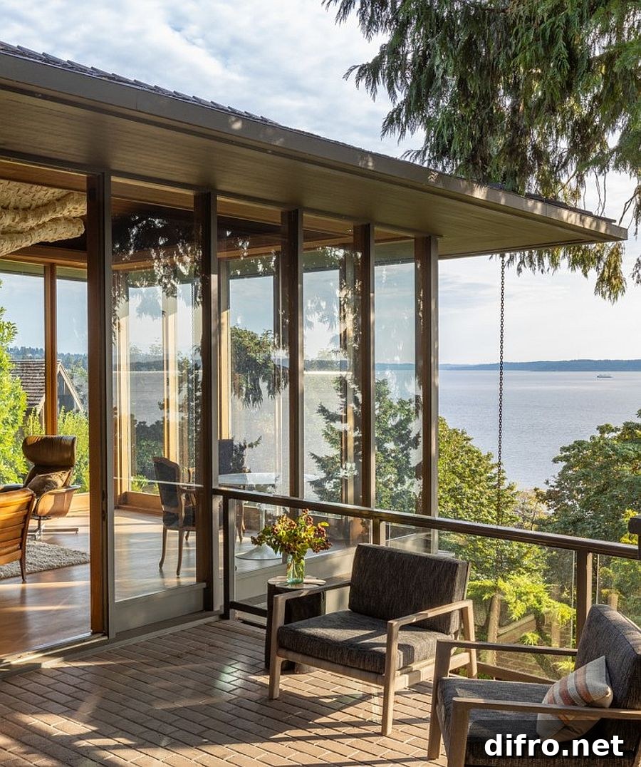Upper level glass walls opening to landscape