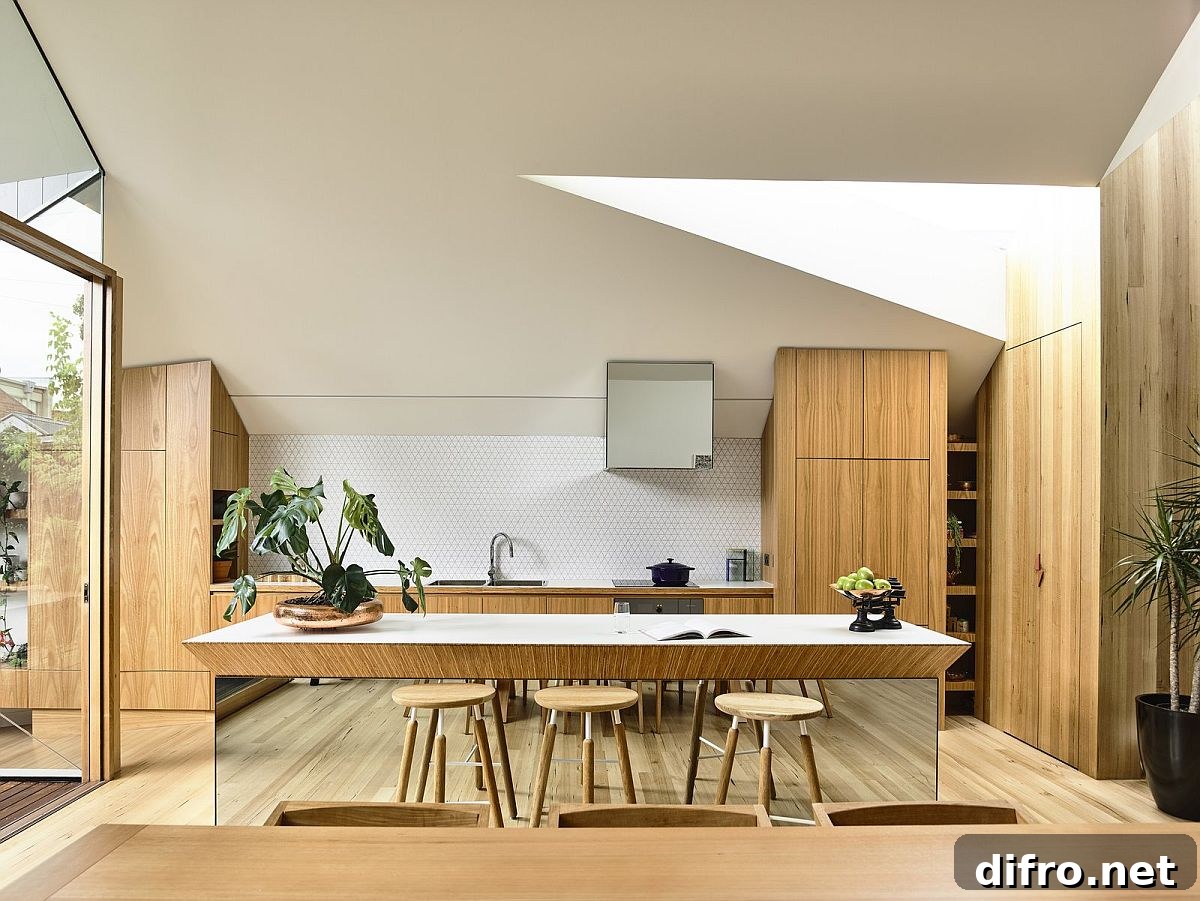 Wood and white kitchen island with mirrored base