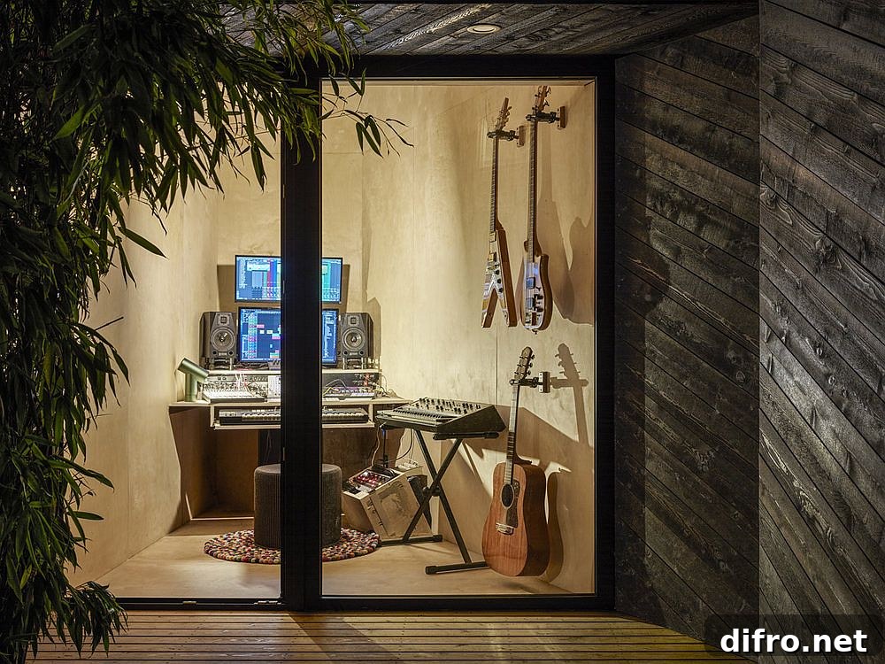 Framed glass doors leading into the backyard music shed