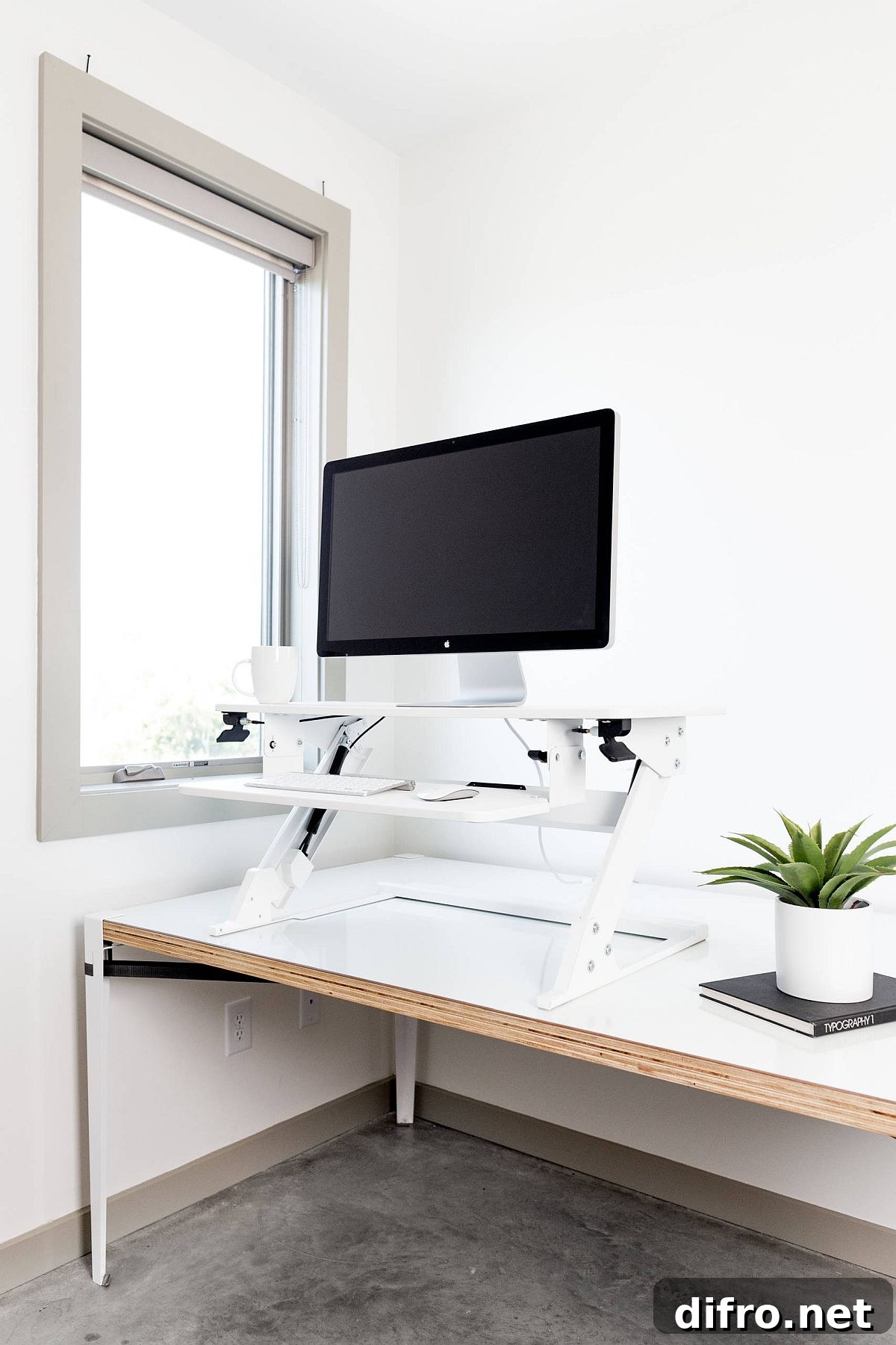 Traditional workstation converted to sit-stand desk