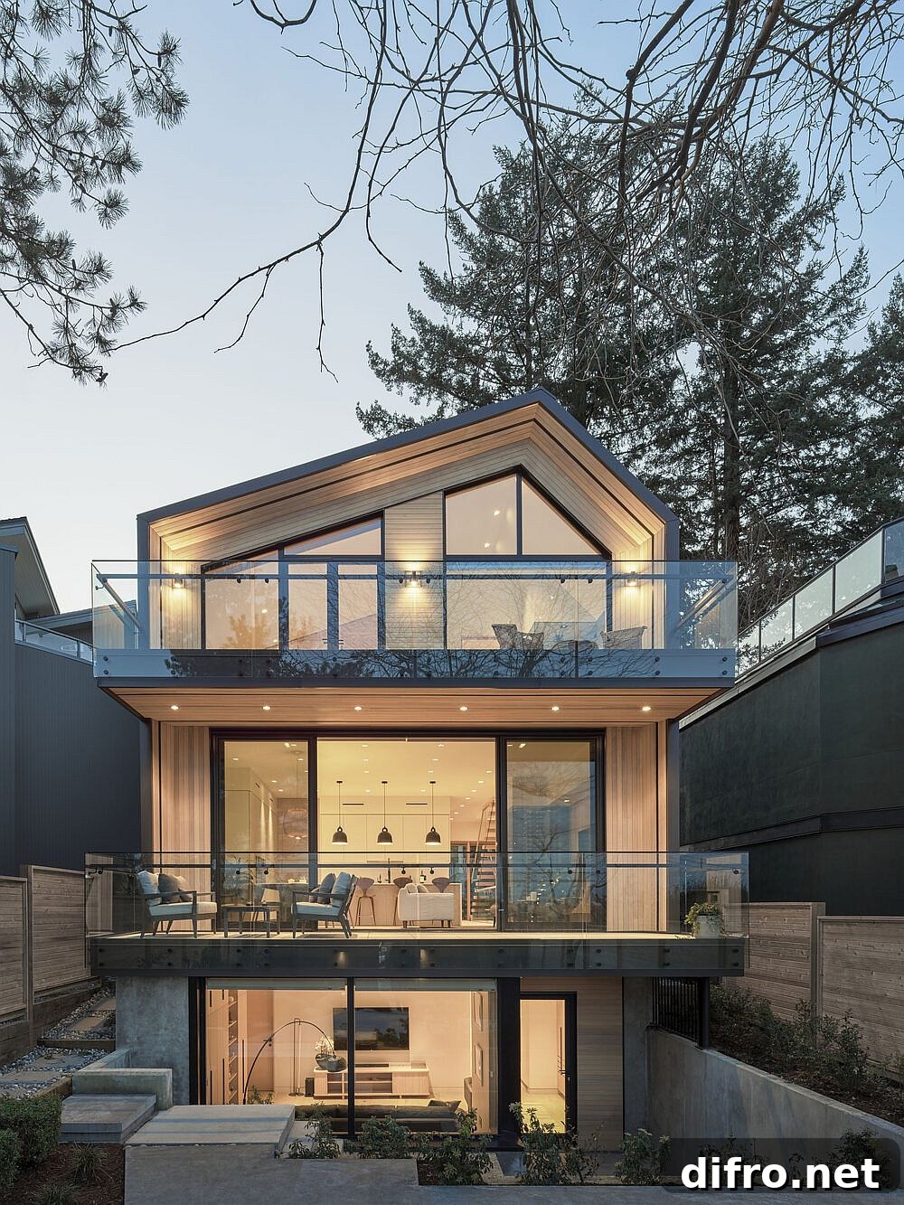 Three levels of a modern Vancouver home in wood, glass and white