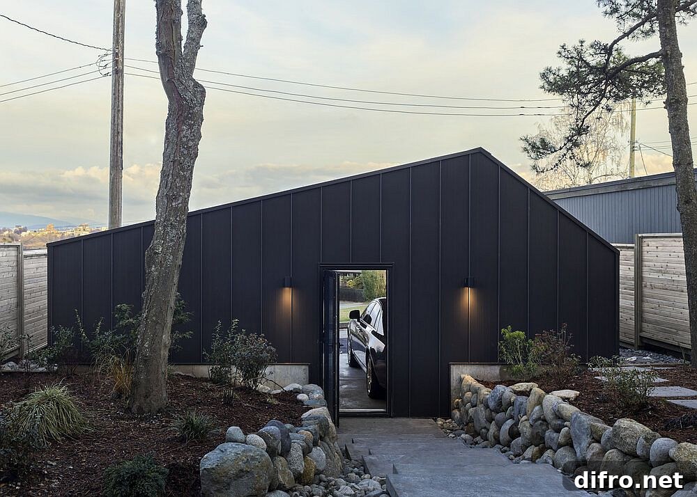 Modern dark gray garage of the Collingwood House