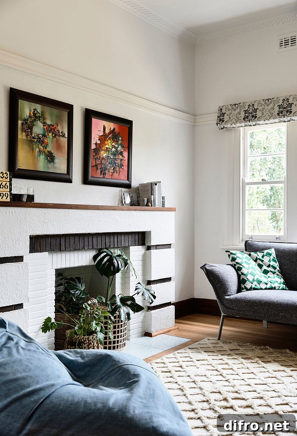 Original elements like the fireplace have been preserved