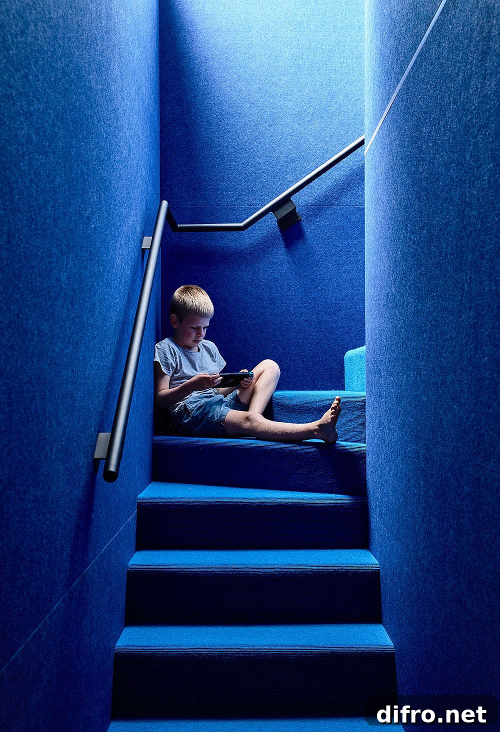Light well illuminating the blue stairway