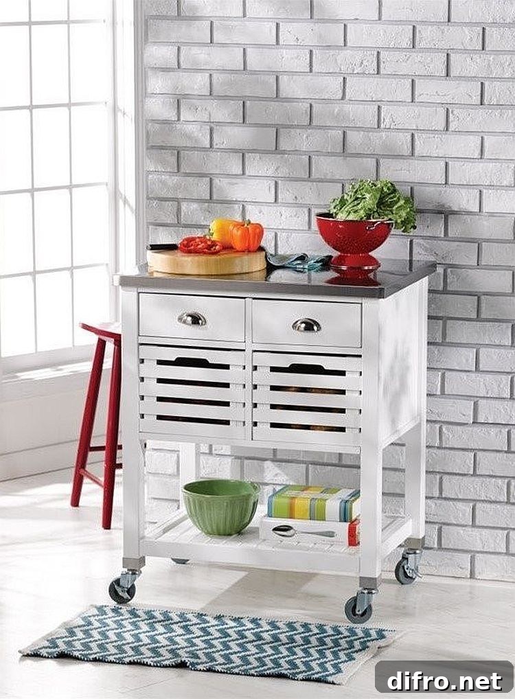 Small cart-style island on wheels for a tiny modern kitchen