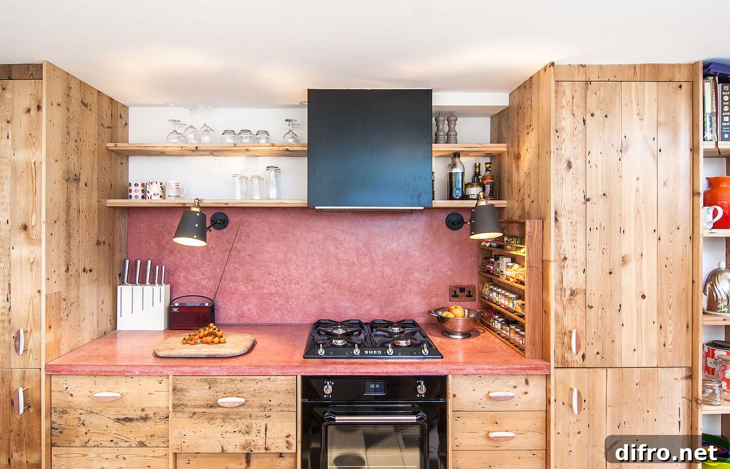 Modern eclectic kitchen with red concrete backsplash
