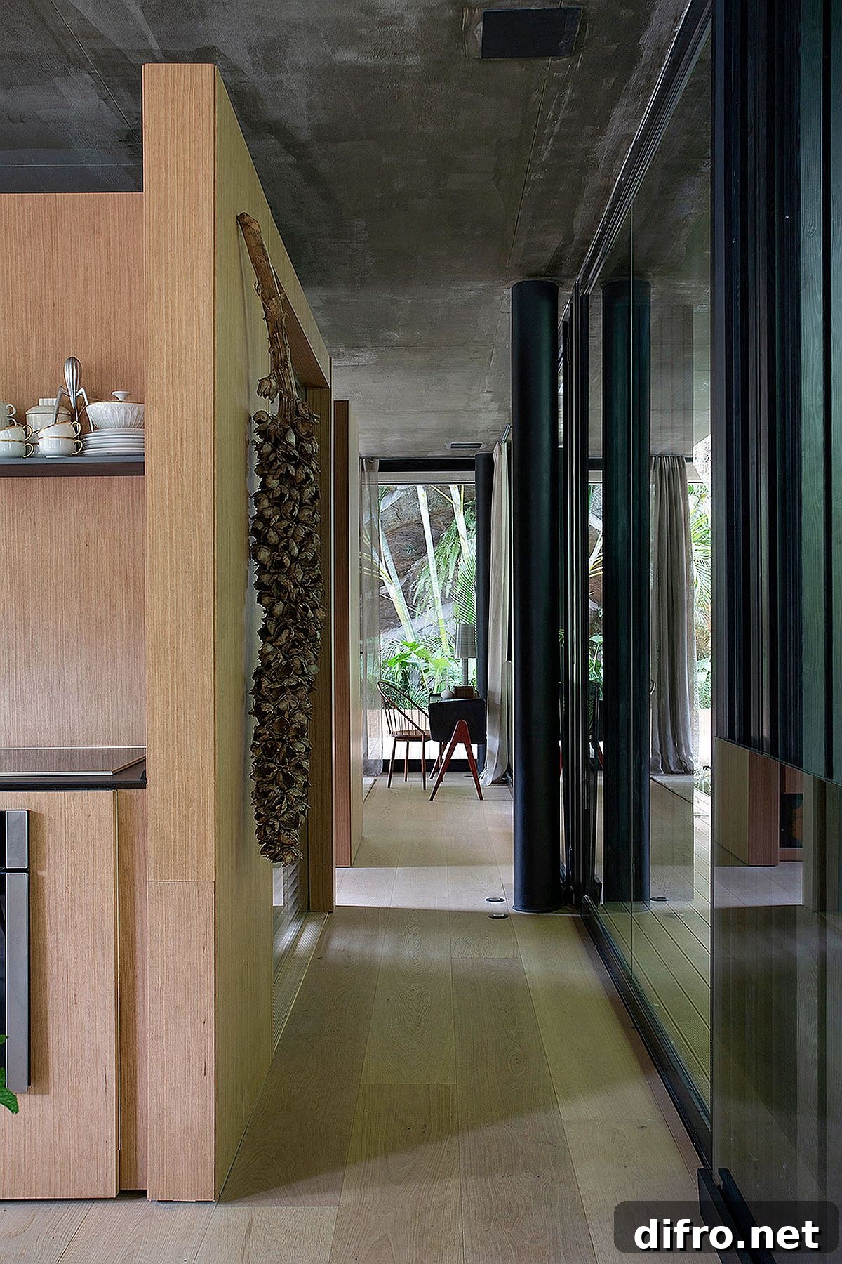 Light-filled modern home with glass, wood and concrete walls