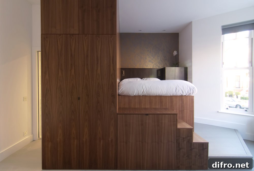 Custom wooden unit inside bedsit showing integrated storage and flexible elements